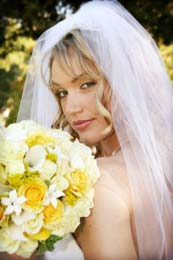 Beautiful blond Bride raises her eyebrows