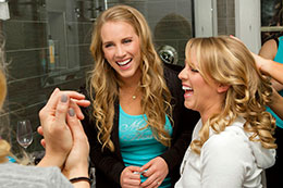 Bride and her twin sister are laughing