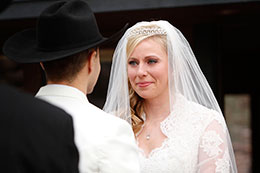 Bride cries during Grooms vows