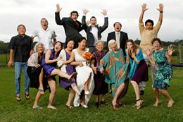 Wedding family all jumps up in Princeville, Hawaii