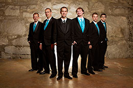 Groom and groomsmen shine for a photo at Chateau Rive