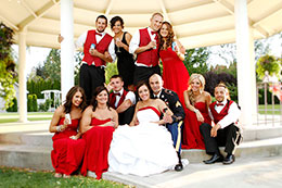 Wedding party in a relaxed pose at Promise Gardens