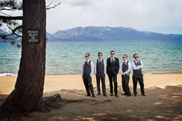 Wedding guys stand by Lake Tahoe