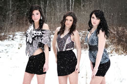 Tasha, Courteny, Tessa freeze as they model in the snow