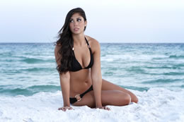 LaShelle models black bikini on tan body on white sand in Destin, FL