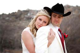 Cowboy Groom looks at his bride