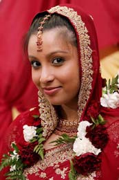 Indian Brides beautifl face in red cover at the Park Hyatt in Dubai