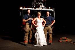Bride poses with sexy firemen