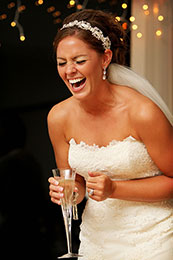 Bride laughs hysterically at the best man toast