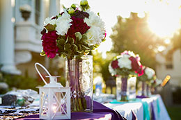 Beautiful wedding reception decorations in the sunset at Moore Mansion