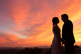 Firery sunset wedding portrait at Mogollon Rim in Arizona