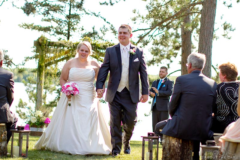Bride and Groom exit wedding ceremony near Cass Lake, Minnesota
