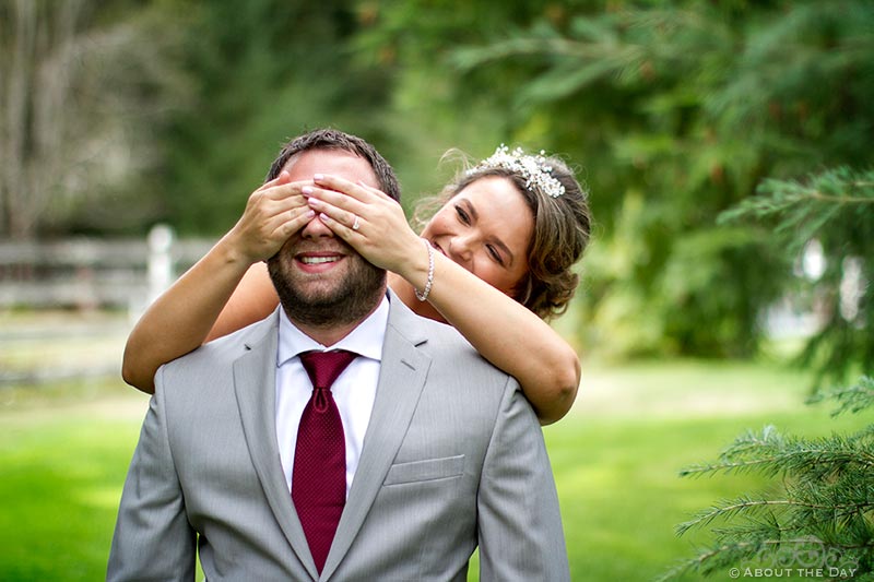 Bride covers Grooms eyes during their first look