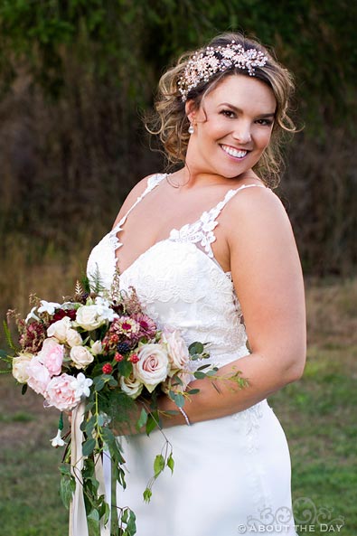 Lovely Bride poses with her flowers