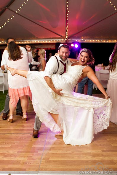 Bride and Groom do a dip while dancing