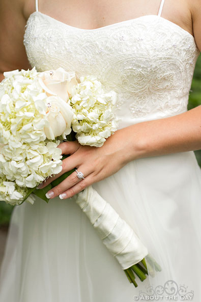 Bride in white with white flowers
