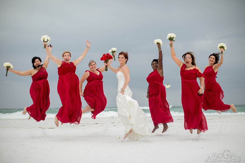 Bride and Bridesmaids jump on Princess Beach in Destin, FL