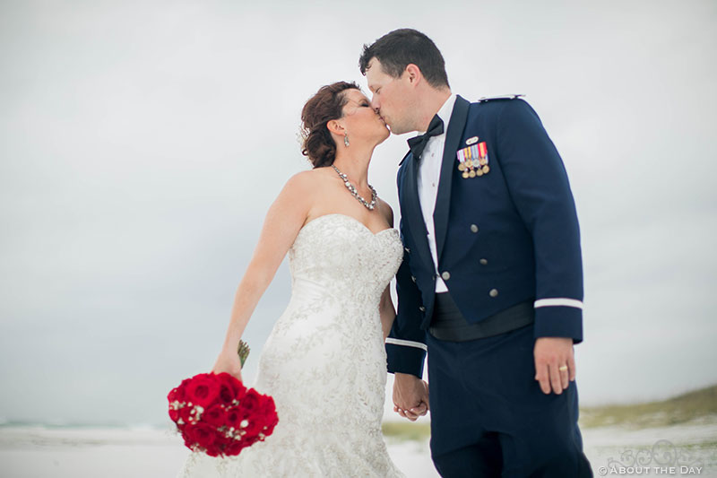 Josh and Rebecca kiss during windstorm at Princess Beach in Destin, Fl