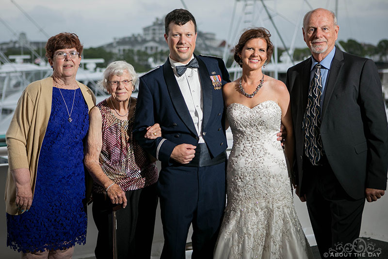 The Wedding couple with their parents and grandmother
