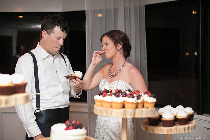 Groom tries to eat his own cake before it's pushed in his face