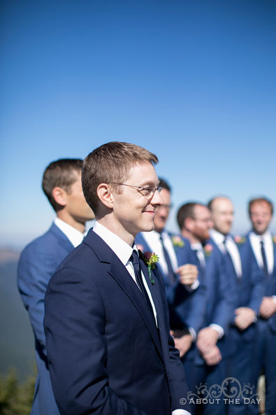 Andrew looks on while Alex comes down the isle