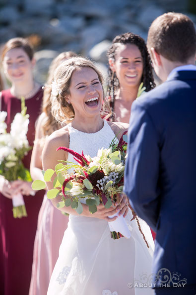 The Bride has a great laugh during the wedding ceremony