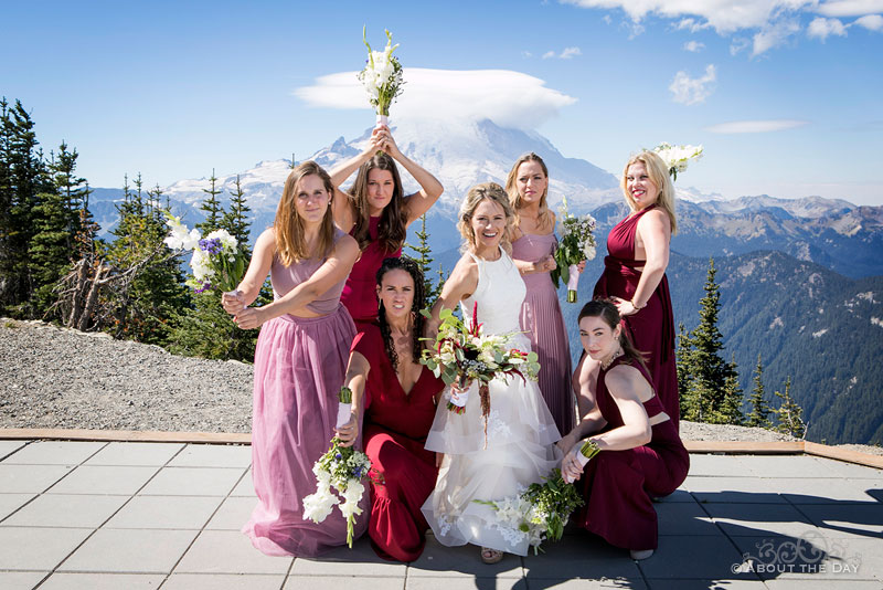 Alex andher Bridesmaids strike a warrior pose at Crystal Mountain