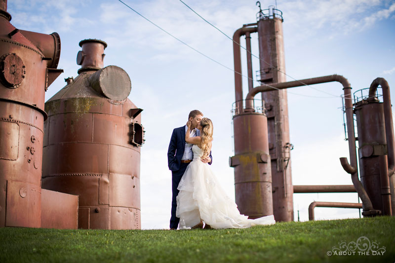 Andrew and Alex kiss amungst the oil tanks at Gas Works park