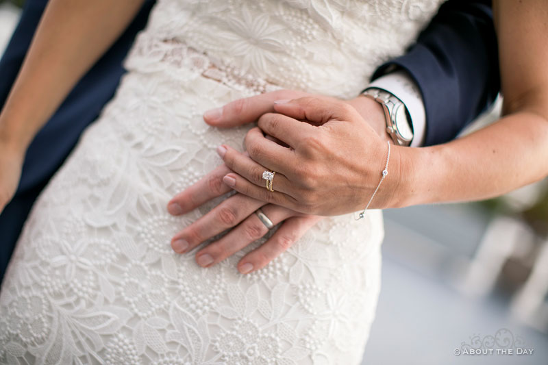 The Bride and Groom show their wedding rings