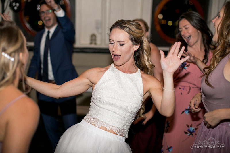 The Bride gets into her dancing during the party