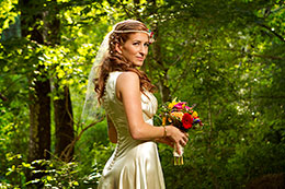 30's theme Bride poses at Hornblower Garden