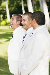 The Groom laughs during the wedding