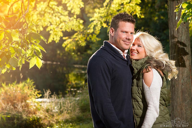 Engaged couple under the trees at Rock Cut State Park