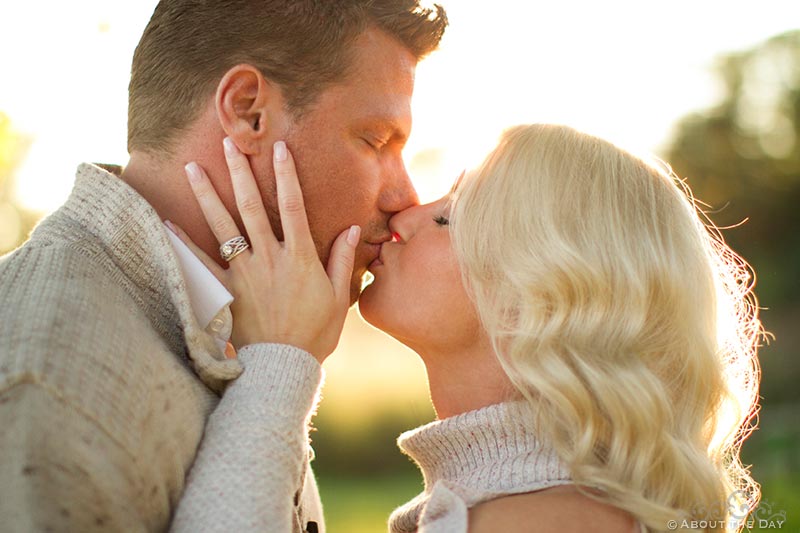 Engaged couple kiss at Rock Cut State Park