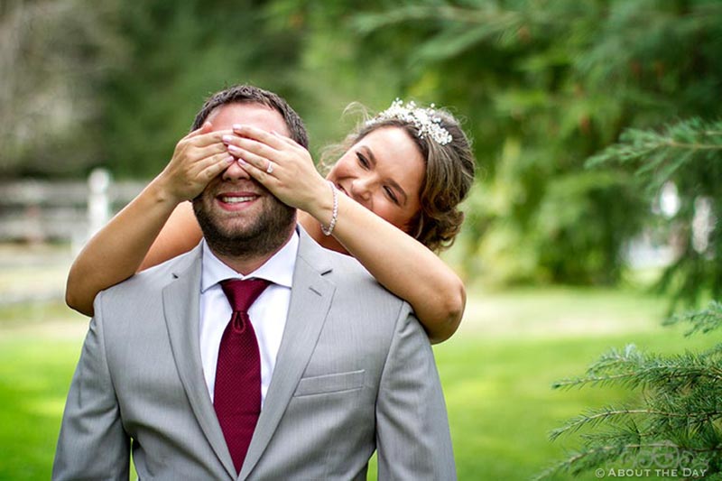 Bride covers Grooms eyes during first look