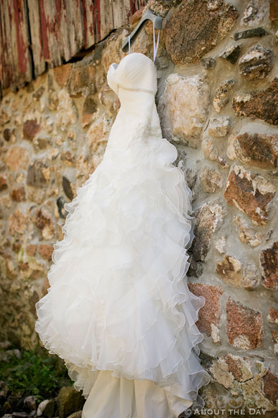 Wedding dress hanging on Youngs Dairy Farm Barn