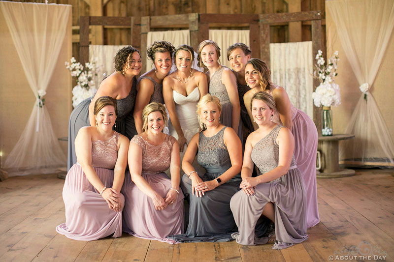 Bride and her bridesmaids at Youngs Dairy Farm Barn in Auburndale, WI