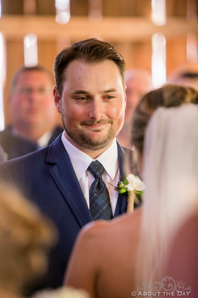 Cody smiles at Bridget during wedding vows