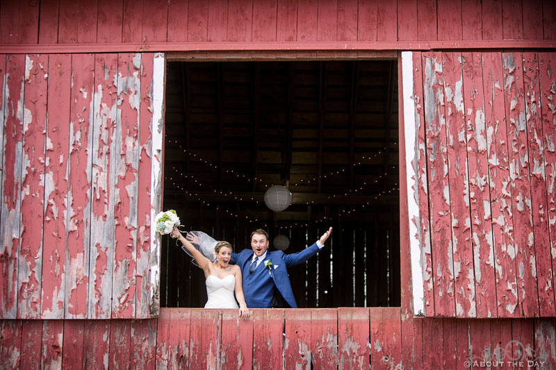 Cody and Bridget celebrate in Barn window at Youngs Dairy Farm