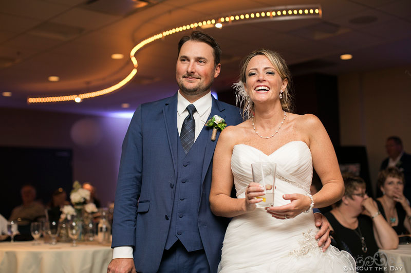 Bride and Groom laugh during toasts at Hotel Marshfield