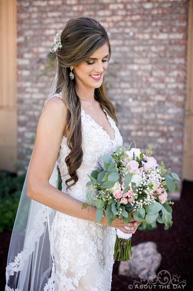 Gorgeous Bride poses with her bouquet