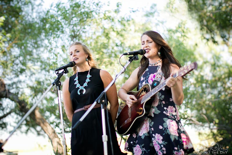 Pretty girls sing country song during wedding ceremony