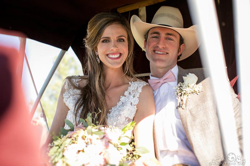 Bride and Groom dance in the carriage to leave wedding