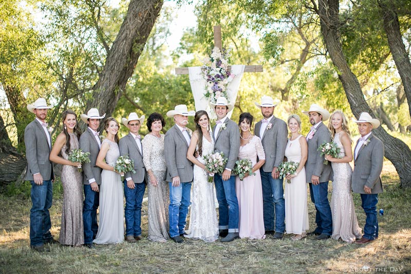 Cowboys and wedding party with Bride and Groom