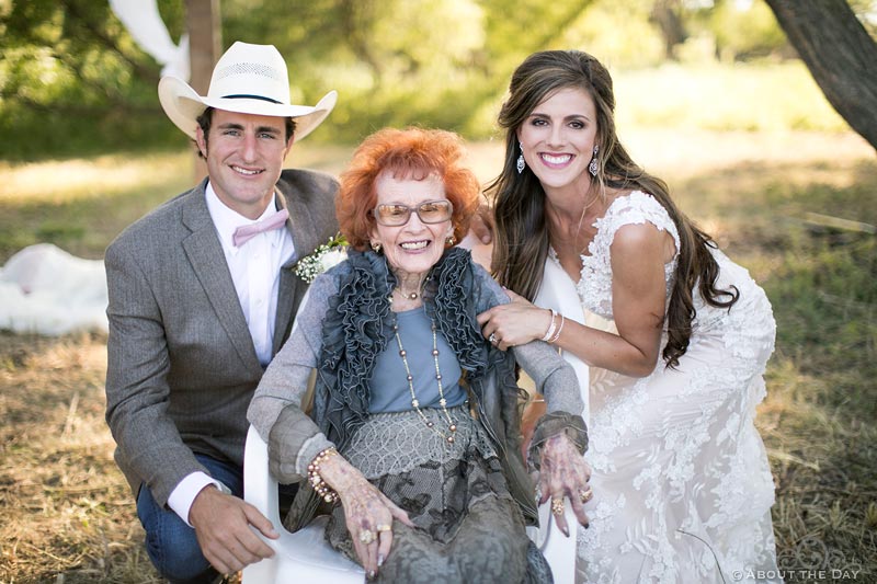 Bride and Groom pose with Grandma