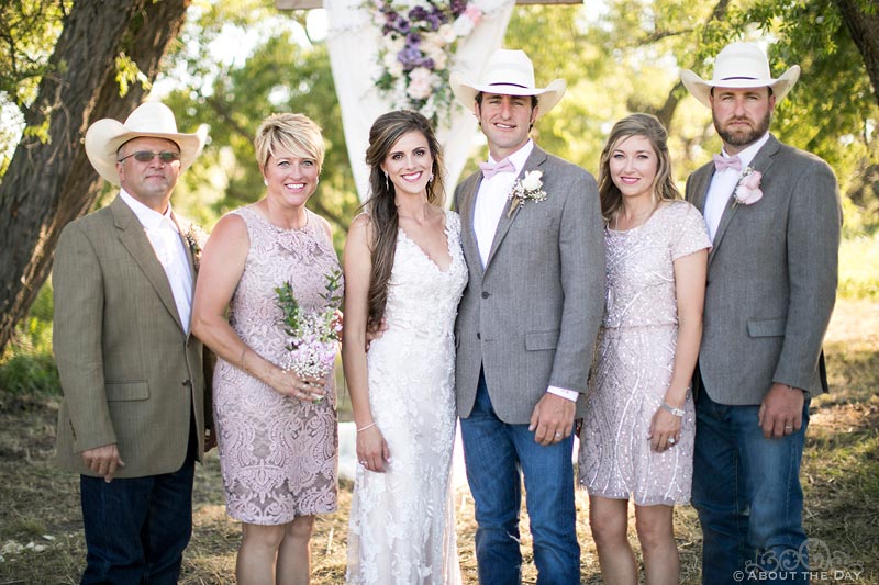 Bride and Groom pose with relatives