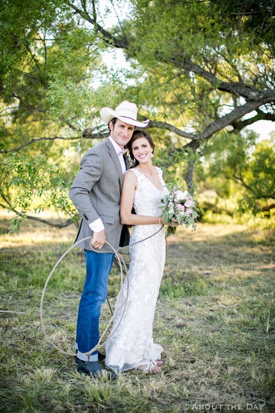 Cowboy Groom uses rope to bring Bride closer