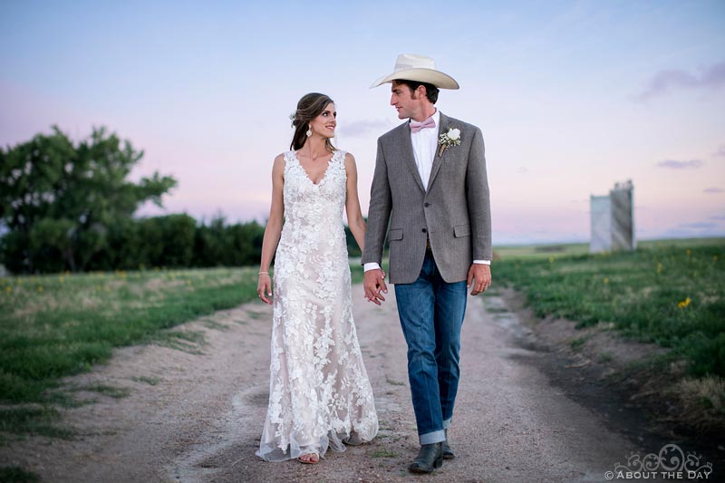 Bride and Groom walking after sundown at Haythorn Land & Cattle Co