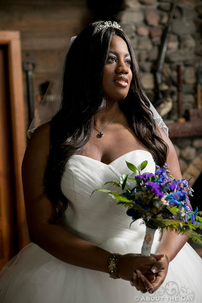 Beautiful Bride poses in hunting cabin in Manitowish Waters