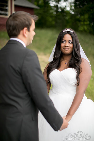 Bride looks at groom during ceremony